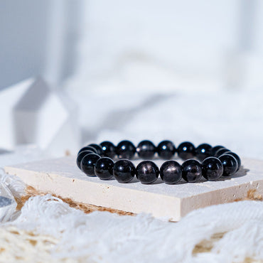 Gold luck stone (black silver line stone) bracelet