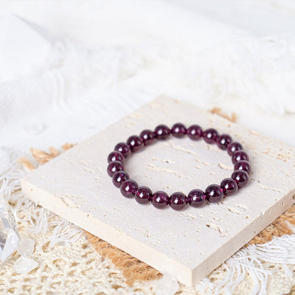 Purple tooth black garnet bracelet (reddish)