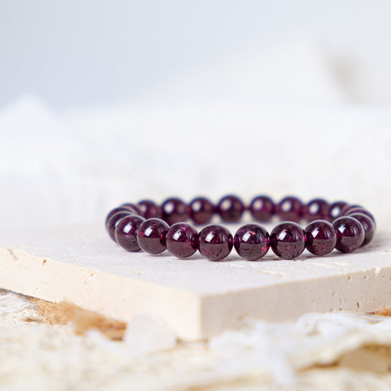 Purple tooth black garnet bracelet (reddish)