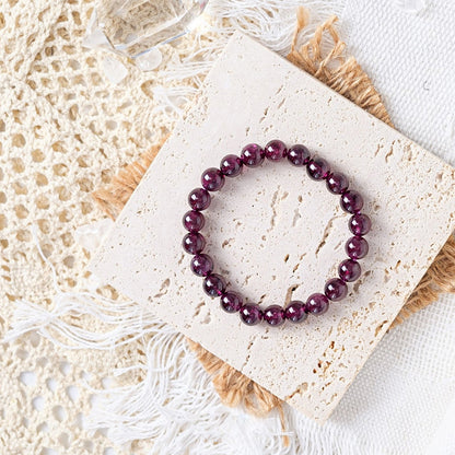 Purple tooth black garnet bracelet