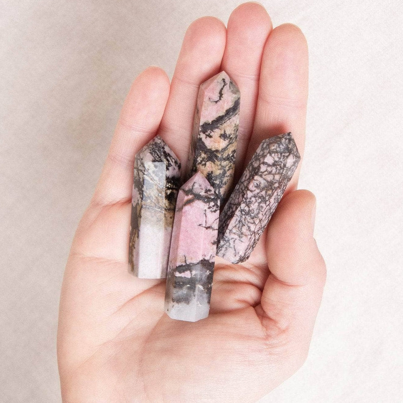 Rhodonite Crystal Point - AAA Premium Quality