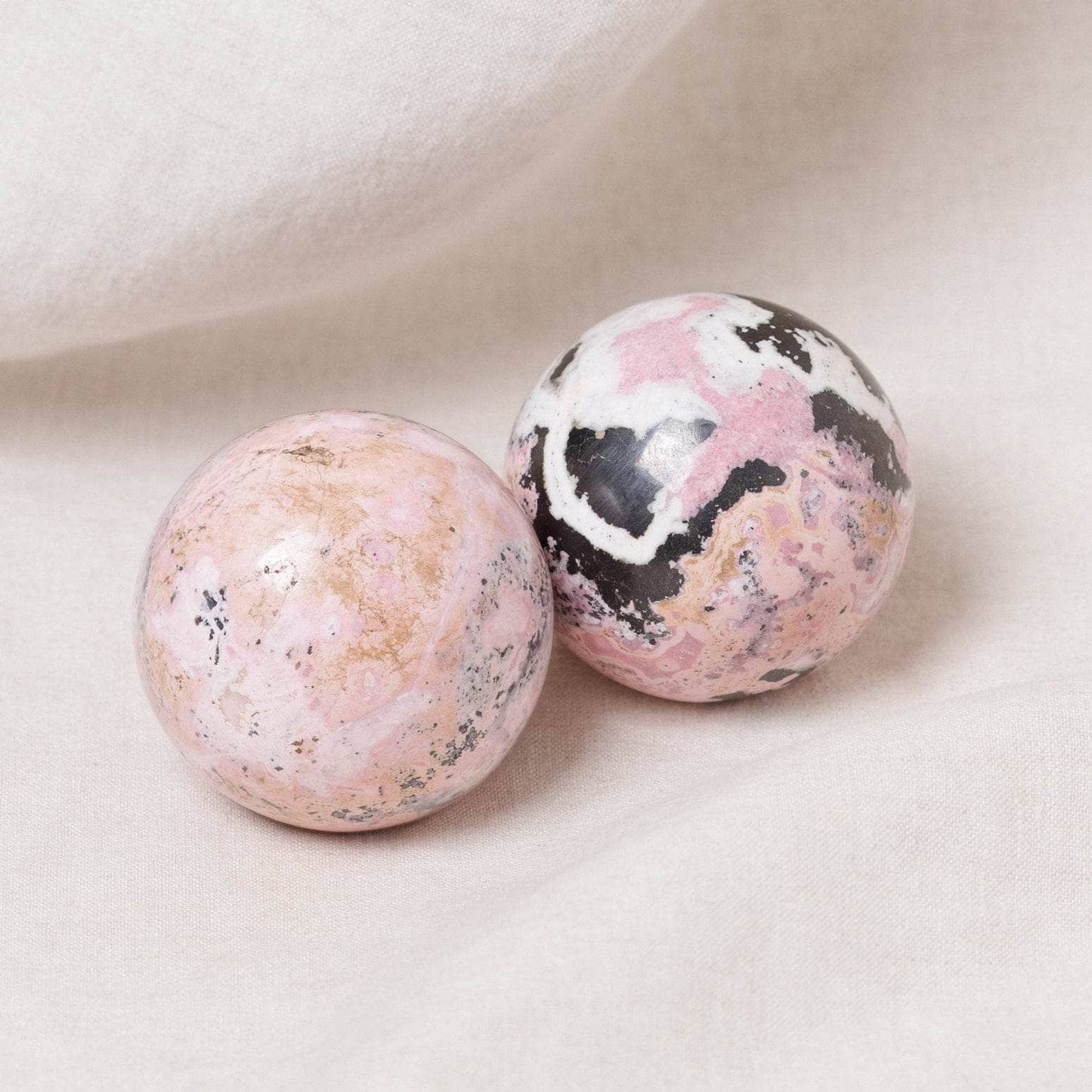 Peruvian Rhodonite Sphere with Tripod - AAA Premium Quality