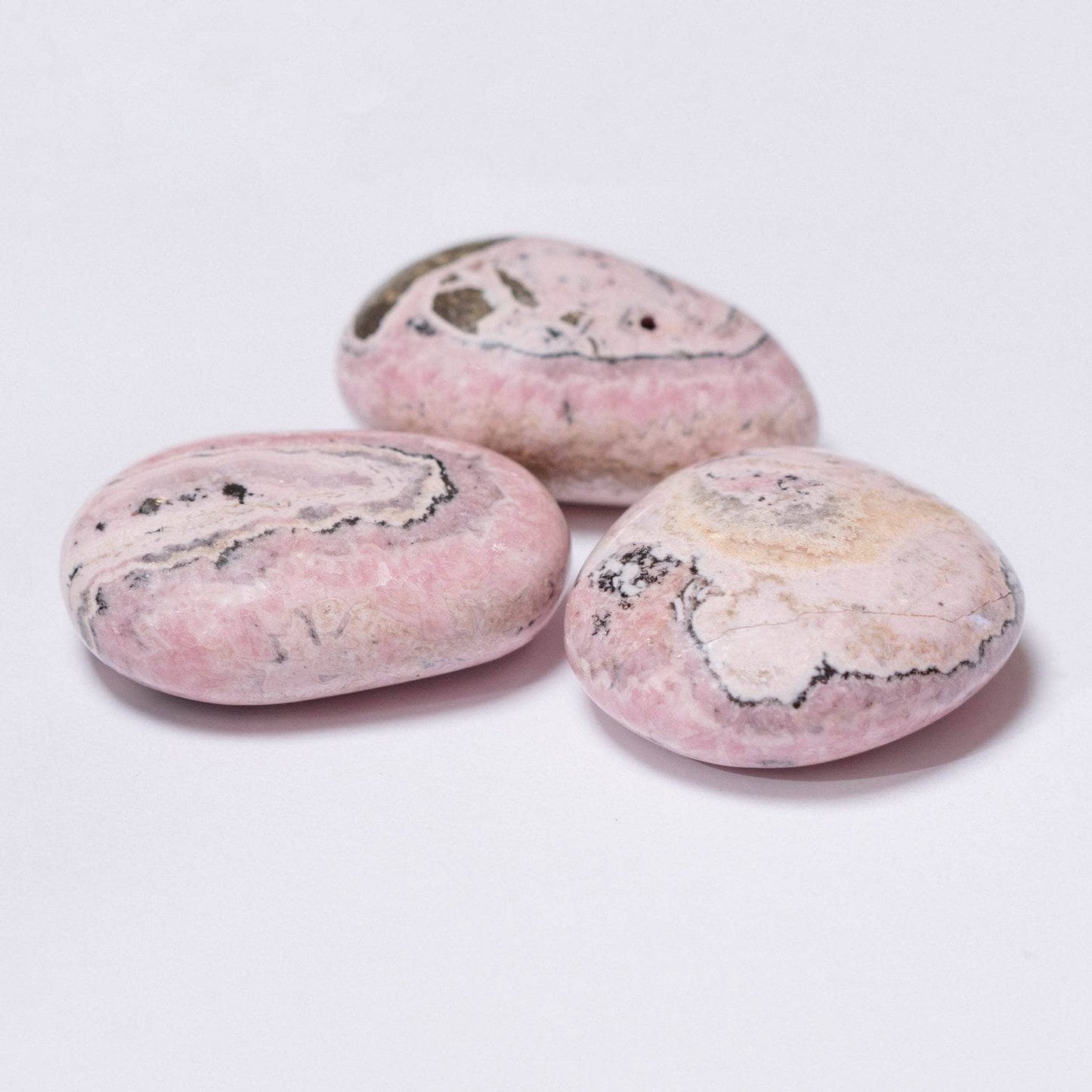 Peruvian Rhodochrosite Palm Stones - AAA Premium Quality
