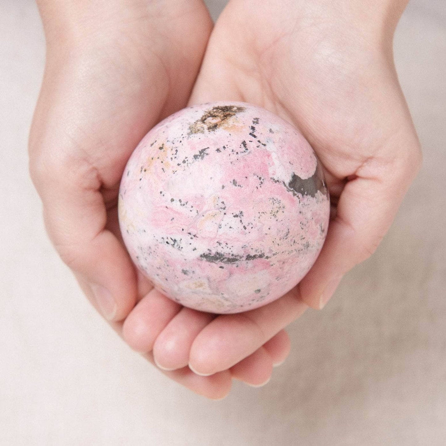 Peruvian Rhodonite Sphere with Tripod - AAA Premium Quality
